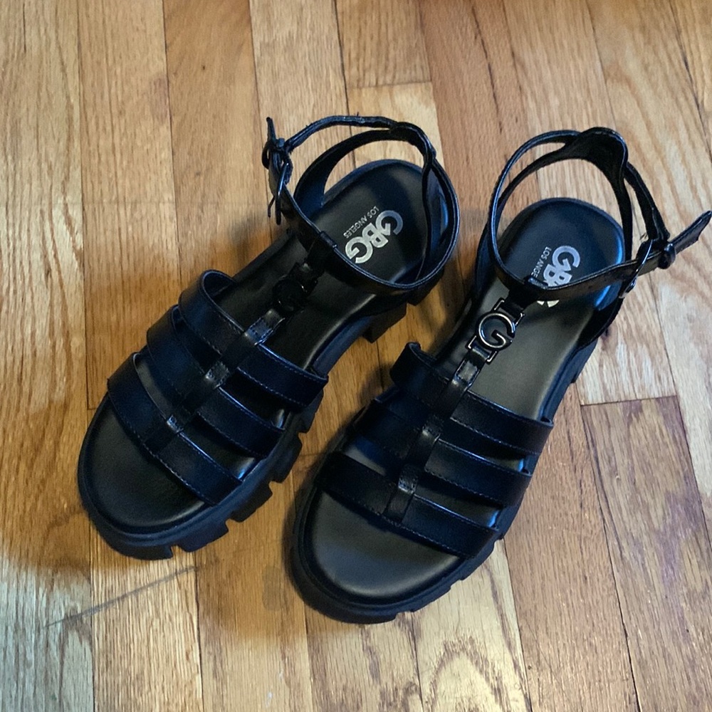 GBG Los Angeles brand black platform sandals.